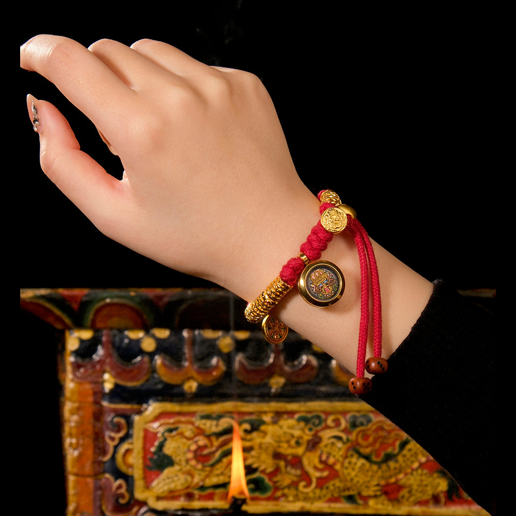 Auspiciousness, prosperity, coiled hand rope, zakiram pendant