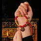 Auspiciousness, prosperity, coiled hand rope, zakiram pendant