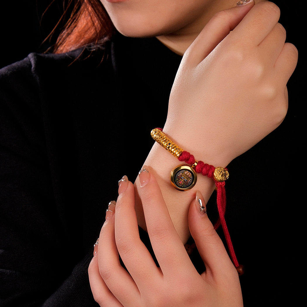 Auspiciousness, prosperity, coiled hand rope, zakiram pendant