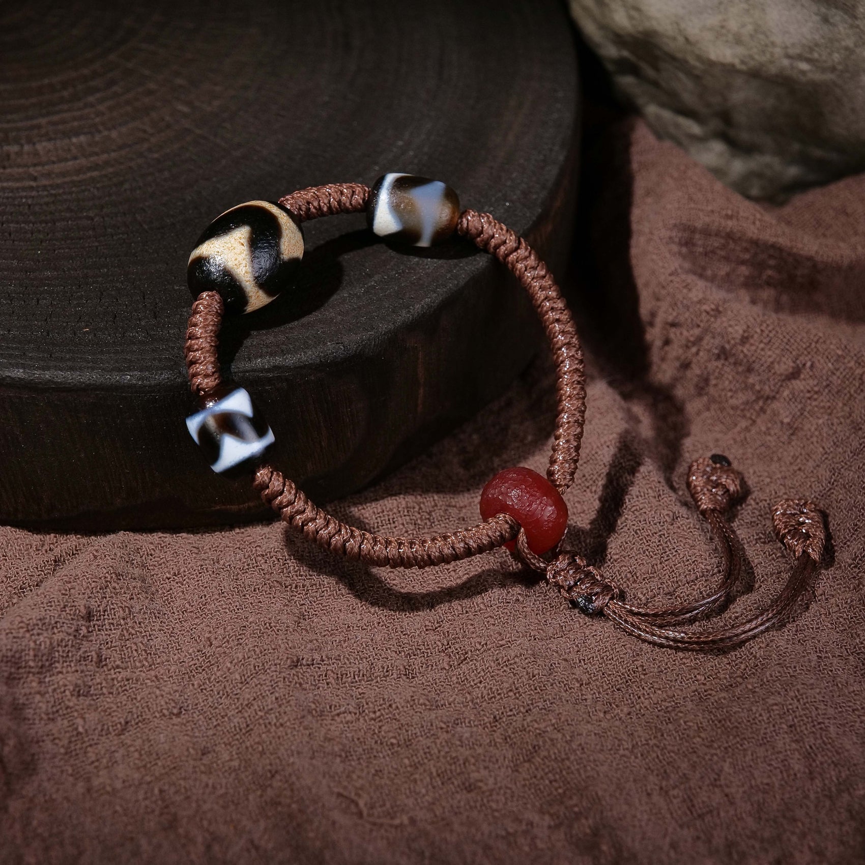 Auspicious to ward off evil hand-woven tiger tooth dzi bead bracelet