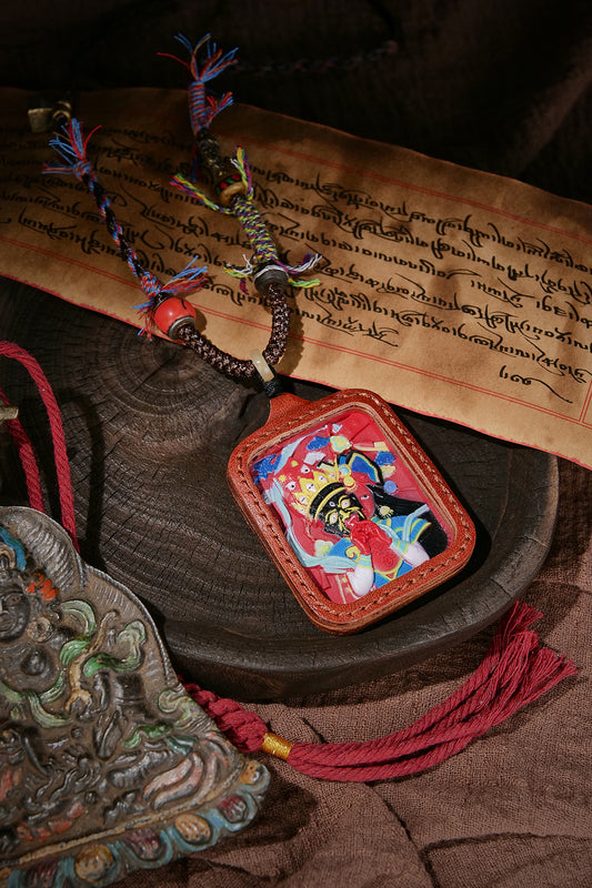 Inviting wealth and blessing peace, hand-stitched leather, vermillion painted zakiram thangka