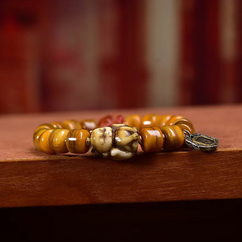 Color Charm Camel Bone Bracelet – Tibetan Mala with Ritual Amulet