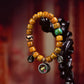 Color Charm Camel Bone Bracelet – Tibetan Mala with Ritual Amulet