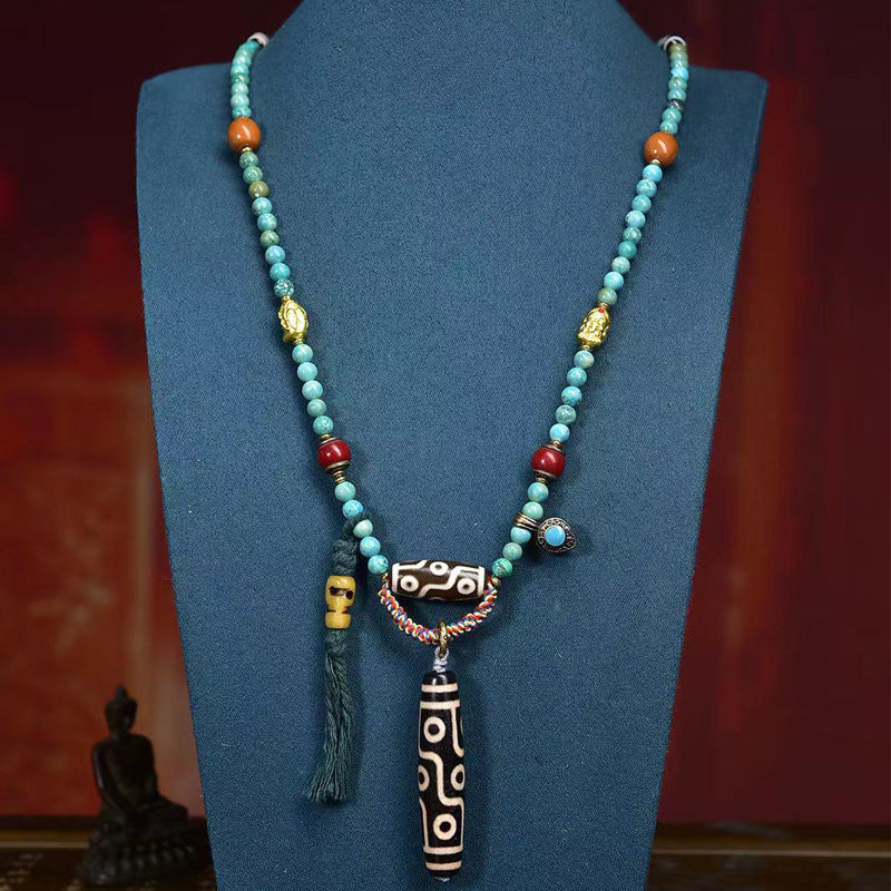 Tibetan Turquoise Mala Necklace with Camel Bone and Nine-Eyed Dzi Bead