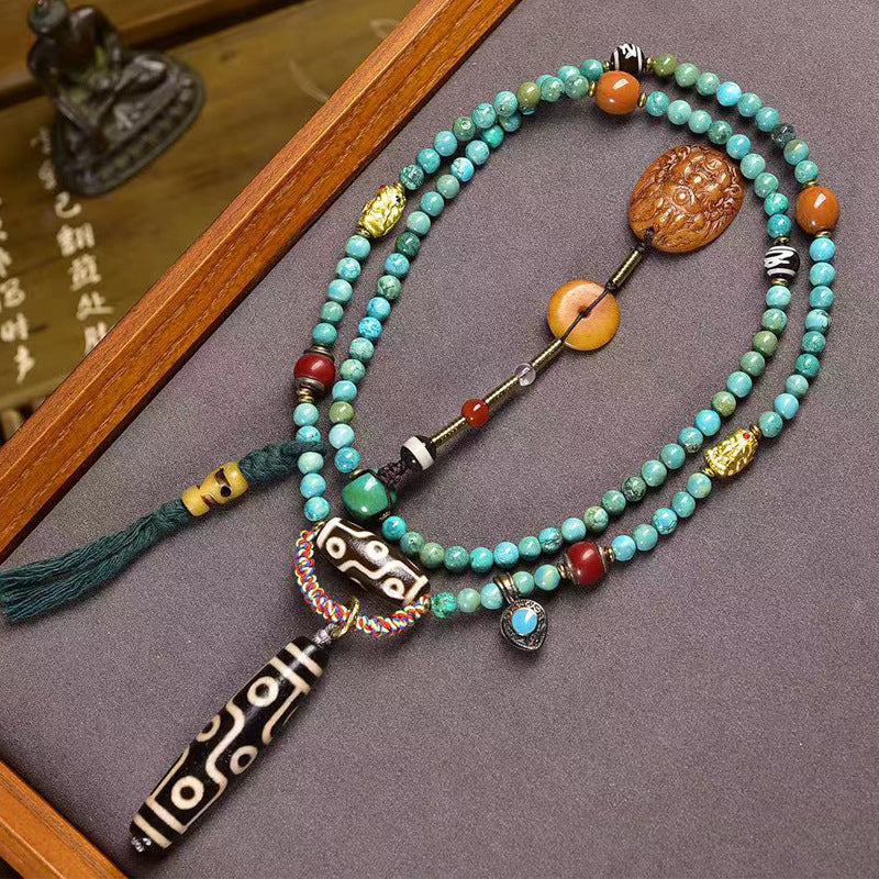 Tibetan Turquoise Mala Necklace with Camel Bone and Nine-Eyed Dzi Bead